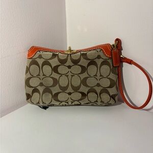 Coach Signature Brown and Orange Clutch